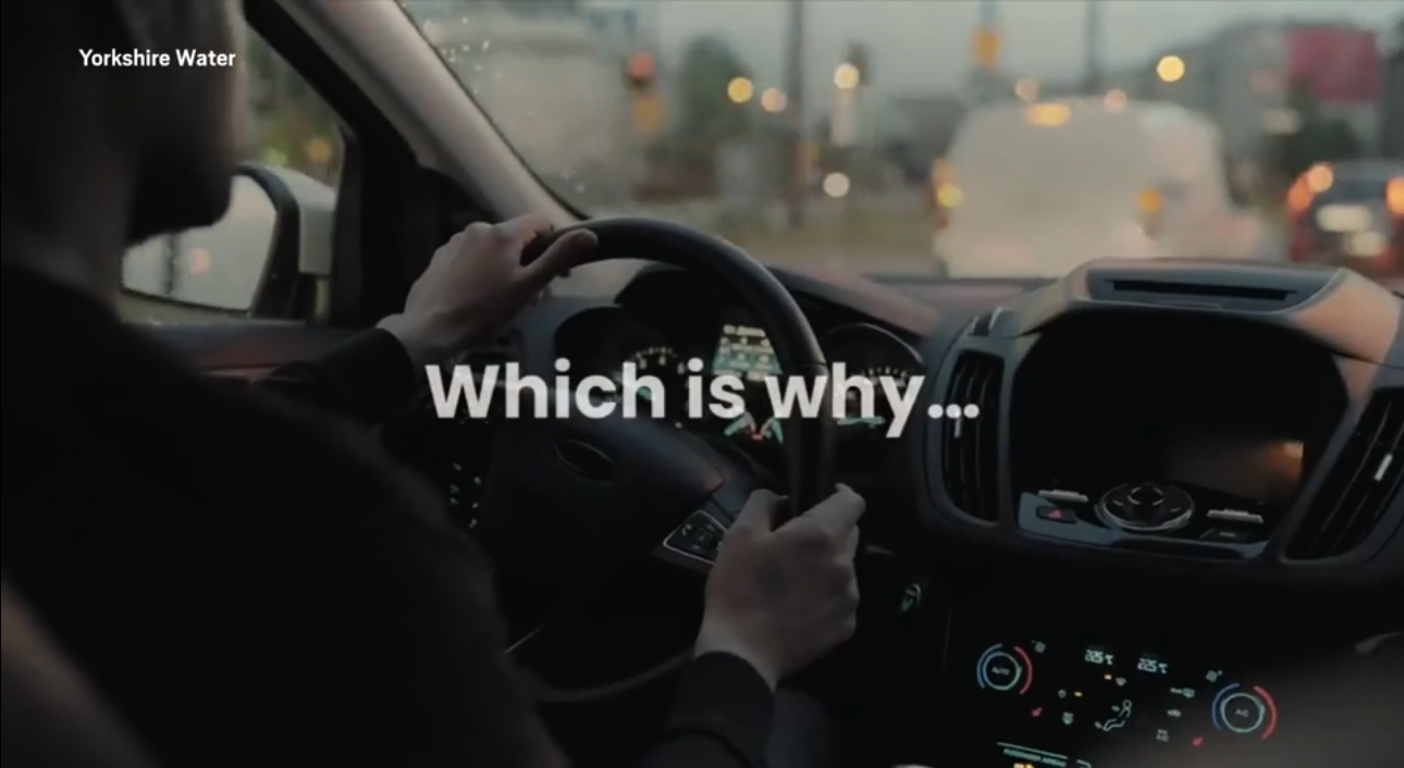 A man in a left-hand drive car in a Yorkshire Water ad